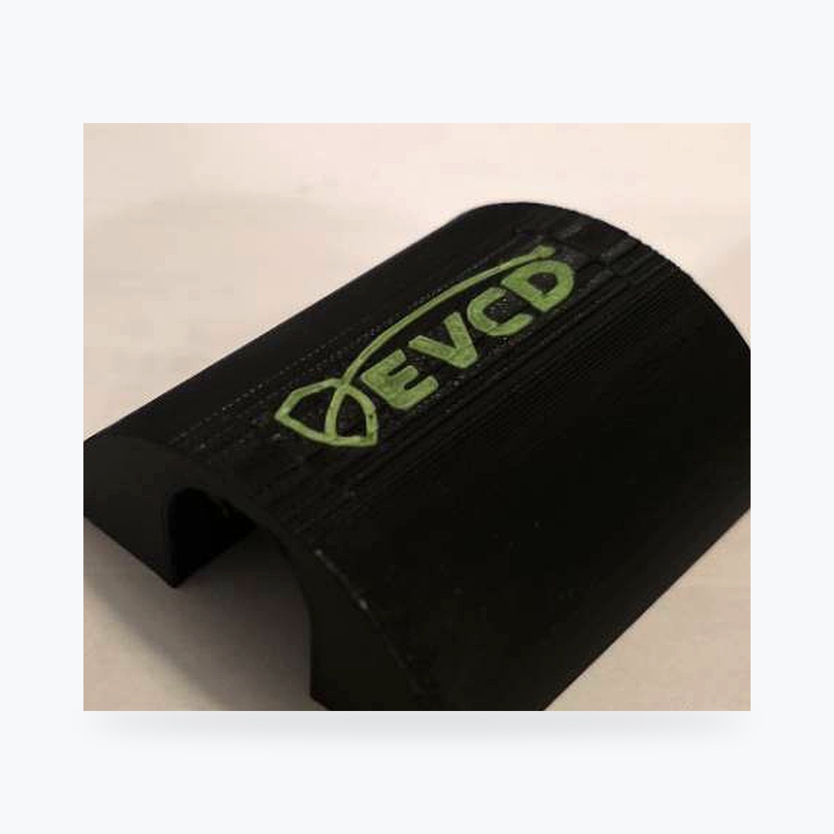 Clean catalog upright view of the current EVCD Arc Solo with the shield-and-cable EVCD logo